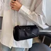 Borsa Semplice borsa cilindrica per il tempo libero da donna 2023 nuova tracolla a catena con cerniera personalizzata su una spalla