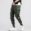 Pantalon Homme Hip Hop Garçon Piste Taille Élastique Sarouel Homme Streetwear Punk Rubans Design Pantalon Homme Poches Noires JoggersMen Drak22