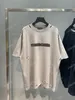 22SS男性女性デザイナーTシャツティースプレーペイントレターパリプリント半袖クルーネックストリートウェアブラックホワイトグレーXINXINBUY XS-L