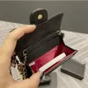 Bayan Çanta Kapaklı Tasarım Çantaları Siyah Havyar/Kuzu Derisi Zincir Cüzdan Pasaport Sahipleri Kart Tutucu Madeni Paralar Cüzdanlar Tasarımcılar Kadın Crossbody ÇANTALAR Bayan El Çantası 11cm