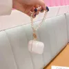 حالة حماية Airpod الفاخرة Mini Shell Conch Metal Key Chain Cilicone Silicone Cases for AirPods 1 2 3 سماعات الرأس مع اللؤلؤ