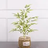 Decoratieve bloemen kransen gesimuleerde bamboe bladplant potten binnen huis landschapsarchitectuur decoratie raam woonkamer nep groen