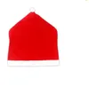 Julfeststol täcker jultomten röd hattstol bakåt täcker Xmas middagstolar Cap Decorations Supplies Lyx09