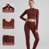 Ajuste de yoga para mujer Cintura alta Hilo para correr fuerte estiramiento color sólido nylon Fitness manga larga y pantalones de bolsillo trajes sin costuras levantamiento de cadera Leggings chándales ss