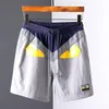 Nouveaux hommes Shorts été essentiels coton mode décontracté lâche hommes petit monstre pantalon voyage Shopping cinq points pantalon