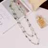 Chaînes bijoux coréens hiver fleur pull chaîne longue perle collier pendentif Double femme colliers pour femmeschaînes Elle22