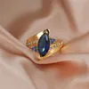 Fedi nuziali Luxury Marquise Blue Zircon Stone Ring Vintage Fashion Yellow Gold Crystal Fidanzamento per donna Uomo Gioielli Regali Wynn22