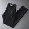 Printemps/été/automne/hiver pantalon jean homme auto-culture pieds brodés style européen jeunesse 220328