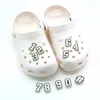 Boucles de chaussures croco fluorescentes, combinaison gratuite, numéro 2D en caoutchouc souple, accessoires de chaussures phosphorescents, décorations, sabots lumineux, breloques pour sandales pour enfants