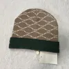 24SSニットハットビーニーキャップデザイナーマンファッションウーマン冬の帽子のためのスカルキャップ4カラー最高品質