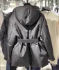 Kvinnor designer långa jackor vinter herr svart pufferjacka kappa vindjacka parkas med bälten Mode bokstäver inverterad triangel dunrock