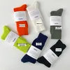 Herensokken modemerk slungelbreiding voor mannen vrouwen cadeau pure kleur eenvoudige stijl sok streep sinaasappel fluorescerende groene socksman's