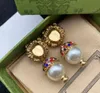 Designerörhängen Öronbrickor dingle ljuskrona Fashion Gold Stud örhängen hänge för kvinnors Luxurys smycken Pearl Lion Ear Ring Ladies Ear Studs Retro Högkvalitativ D