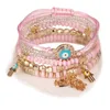 Malvado ojo encantos pulseras diseño de moda fátima hamsa mano pulsera brazaletes para mujeres multicapa trenzado hechos a mano perlas joyas pulseras