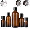 Imballaggio Vuoto Bottiglia marrone trasparente Spalla tonda Coperchio a vite nero con tappo interno Contenitore per imballaggio cosmetico ricaricabile portatile 5ML 10ML 15ML 20ML 30ML 50ML 100ML