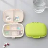 8 grilles étui à pilules de voyage Portable avec coupe-pilule organisateur conteneur de stockage de médicaments boîte à comprimés en plastique boîtes à pilules en plastique