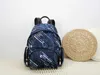2023 Дизайнерские рюкзаки рюкзаки для альпинизма Duffel Bags School рюкзаки мужские женские сумочки кошельки нейлоновые кожаные сумки для плеч 9047