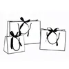 Gift Wrap Creative design Large Black border White kraft paper-bag with handle Wedding Party Favor bowknot Paper Gift Bag SN4489