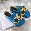 Slippers early spring JW chain Baotou semi slippers women lazy wear Muller shoes flat bottomed round head casual single d525