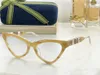 Solglasögon 2023 mode solglasögon för kvinnor designer vintage retro trangulära kattögon glasögon transparent hav uv400 svartblå leopard g-form glasögon s6yd