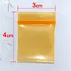 100 pçs Sacos de plástico pequenos transparentes grossos Saquinhos com zíper Fechamento com zíper Reutilizável Saco poli transparente Armazenamento de alimentos 3*4cm20 Saco ziplock cor de seda Mini embalagem de joias