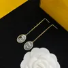 Nouvelle designer Femmes Maules d'oreilles Double lettre de charme à goudrons Stydle Personnalité de tempérament Girl Gold Pendant Pendards With Gift Box