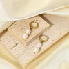Dingle ljuskronor guldpläterad 2mm båge pärlörhängen geometriskt rostfritt stål sötvatten huggie örhänge för kvinnor smycken gåva