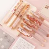 Gel Pens PCS/Lot Kawaii Caramel Pudding Bear Black Ink Mechanical Pen School School Supply Supplyery Cute Gip Gowsgel