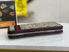 デザイナーウォレットシングルジッパーウォレットは、男性と女性向けの目を引く赤と緑のウェビング高品質の財布を備えた牛革で作られています291105