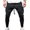 Pantalon masculin High Elastic Men 2022 confortable Couleur solide DrawString Design Jogging pantalon pour les Wearmen quotidiens