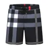 Casual pants for mens summer beach Pants fashion Men's Shorts designer loose style plaid color men jeans large size