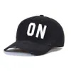Модельерные шляпы высококачественные хлопковые унисекс регулируемые бейсбольные шапки вышитые буквы Черная шапка для мужчин
