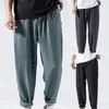 Męskie spodnie męskie stylowe hip-hopowe męskie sznurkiem Super cienkie jednokolorowe oddychające wiele kieszeni miękkie spodnie haremowe do uprawiania sportu