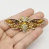 10pcs / lot Blue Crystal Rhinestone Email Belle broche Cicada Broch pour les femmes