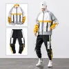 Tute da uomo Giacca da lavoro Hip Hop Pantaloni da tuta da uomo Set da 2 pezzi Baseball Nastri con cerniera sciolti Cappotto Abbigliamento lungoUomo