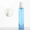 Emballage Vide Verre Clair Bleu Bouteille Épaule Plate Couvercle Blanc Blanc Presse Pompe Portable Rechargeable Emballage Cosmétique Conteneur 20 ml 30 ml 40 ml 60 ml 100 ml 120 ml