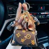 Leather Key Chains Rings Jewelry Brown Flower Plaid Tassel Coin Purse Keyrings Holder Fashion Mini Storage Handbag Keychains Accessories Cute Bag Pendant Charms