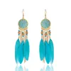 Pendientes de plumas étnicas para mujer Brincos bohemios redondos con forma de sol, pendientes colgantes con borlas de cadena larga dorada, joyería tailandesa, bisutería