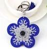 Nyckelringar Novelty Key Chain Artiklar Söt CAP Rhinestone Leather Snow Flower Anime Cover Multi Colors Wholesale Enek22