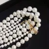 Vrouwen trui kettingen luxe ontwerper lange hanger ketting Pearl klassieke stijl strengen snaren elegante kettingbrief meerlagige sieraden dames bruiloft cadeau