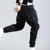 Mäns byxor Solid Color DrawString Elastic midjfickor Hem Croped Multi Pocket Cargo Trousers Streetwear 220826