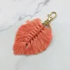 Bohemian Beach Style Party levererar handvävd bladknapp Keychain Pendan