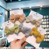 2022 autunno e inverno nuovi accessori per capelli per bambini coreani moda per bambini lavorato a maglia fiocco di lana forcina dolce ragazza a becco d'anatra clip copricapo