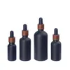 Flaconi contagocce in vetro smerigliato nero Flacone per profumi di olio essenziale con tappo in plastica a grana di legno da 5 ml a 100 ml SN4568