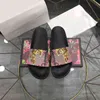 Mest populära designers pour hommes glissades pantoufles femmes mode lyx floraux en cuir en cuir flor