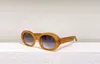 Rosa /brun gradient runda ovala solglasögon för kvinnor solglasögon wrap sommar uv400 glasögon med låda