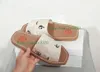 a1 Nuove pantofole romane intrecciate Sandali legnosi Sandali con stampa di perle Sandali di tela da donna piatti larghi estivi Pantofola di design di lusso