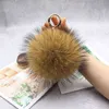 Luxo 15cm y Real Fox Fur Ball Pom Poms Fur Pompom Ball de alta qualidade Chain Chain Chain Metal Ring Pinging for Women F281 AA2203188930018