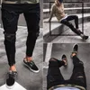 Jeans da uomo Mens Cool Designer Fashion Black Skinny Strappato Stringed Stretch Slim Fit Hop Pants con fori per gli uomini