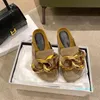 Slippers early spring JW chain Baotou semi slippers women lazy wear Muller shoes flat bottomed round head casual single d525